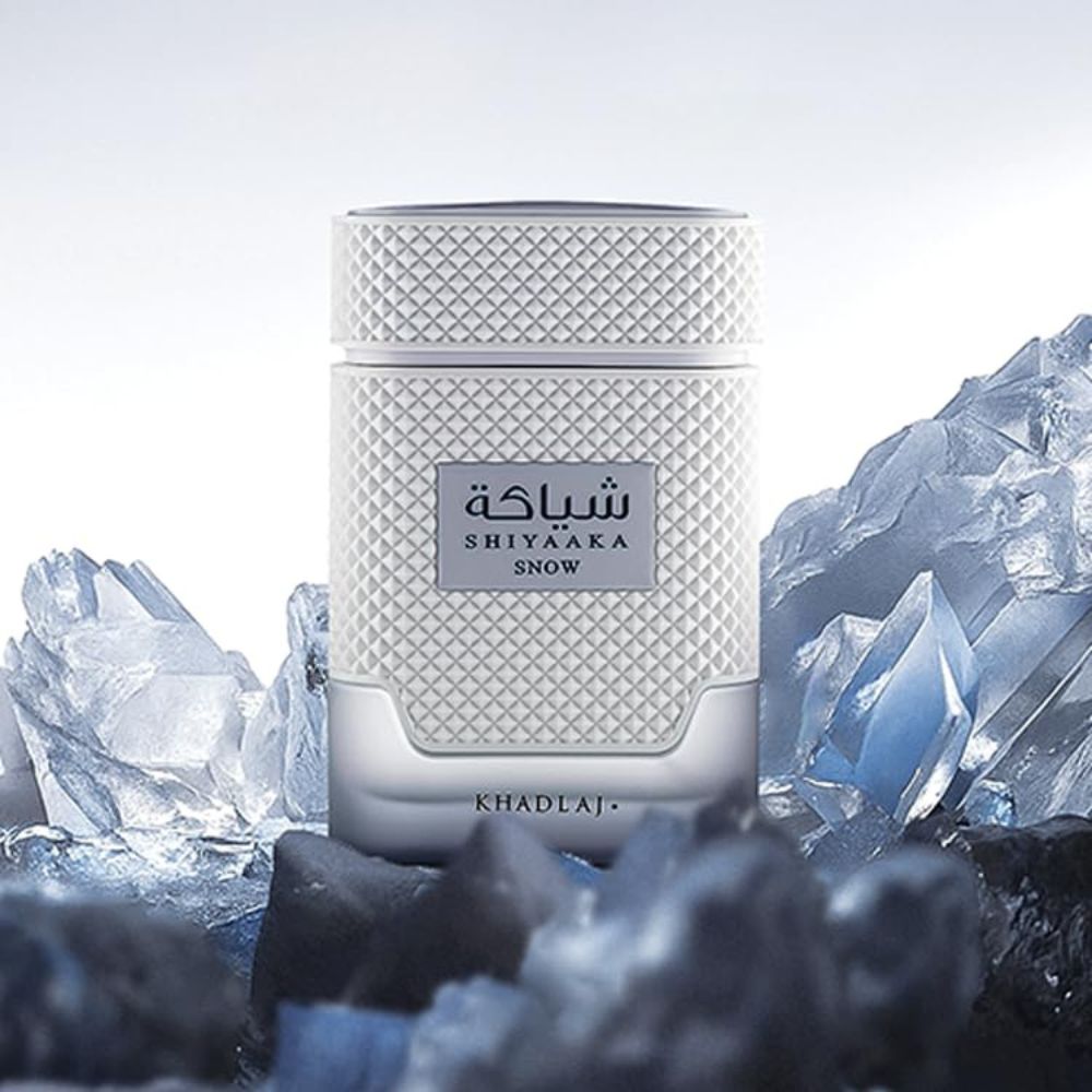 Khadlaj Shiyaaka Snow Eau De Parfum 100ML for Women and Men perfume bottle ice backround