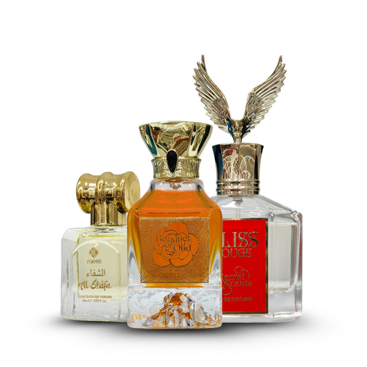Luxury Findley fragrance bundle featuring Bliss Rouge EDP 100ml, Bouquet of Oud EDP 100ml, and Raees Roll-On 20ml by Secret Scents and Raees.
