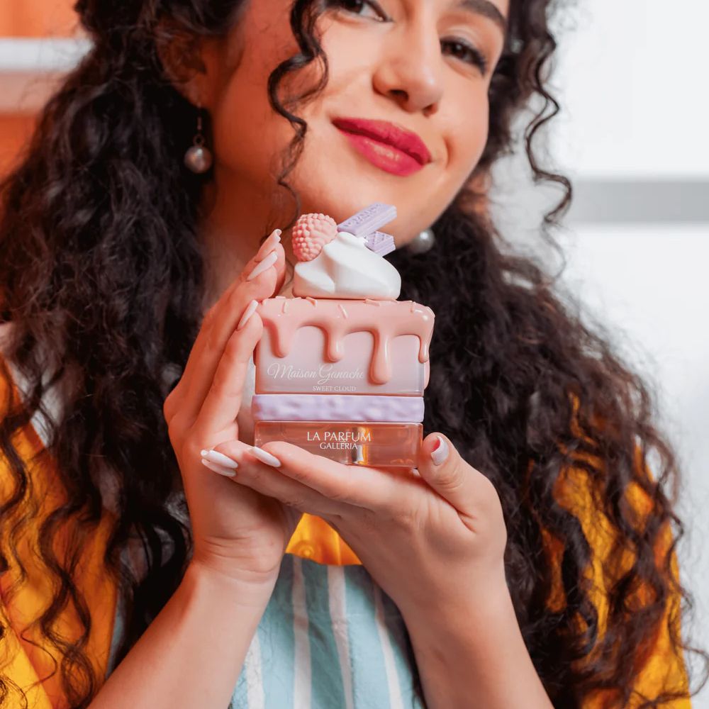 La Parfum Galleria Sweet Cloud Eau De Parfum 100ML unisex perfume bottle with a model